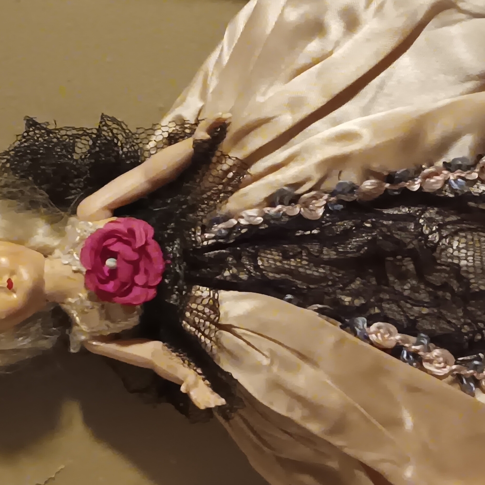Elegant Doll with Lace and Floral Accents